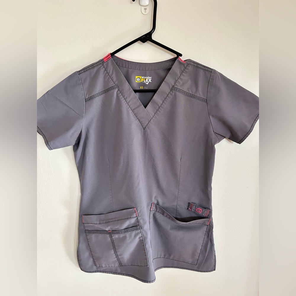 Two sets of Women’s Scrubs in Gray and Pink. Extra women’s scrub top included!